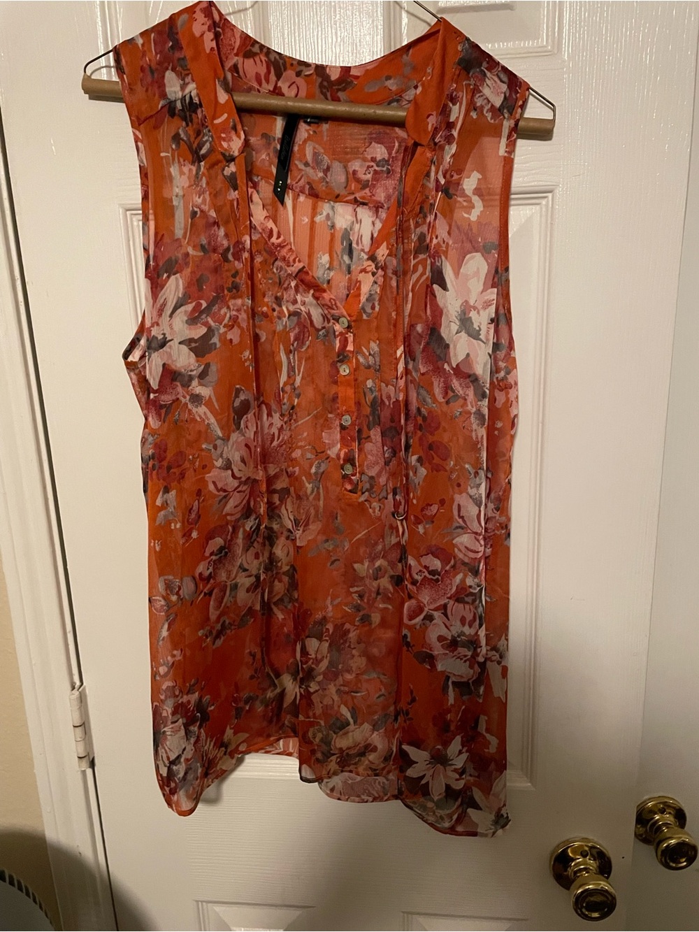 Bellatrix Orange Floral Sheer Sleeveless V-Neck Blouse